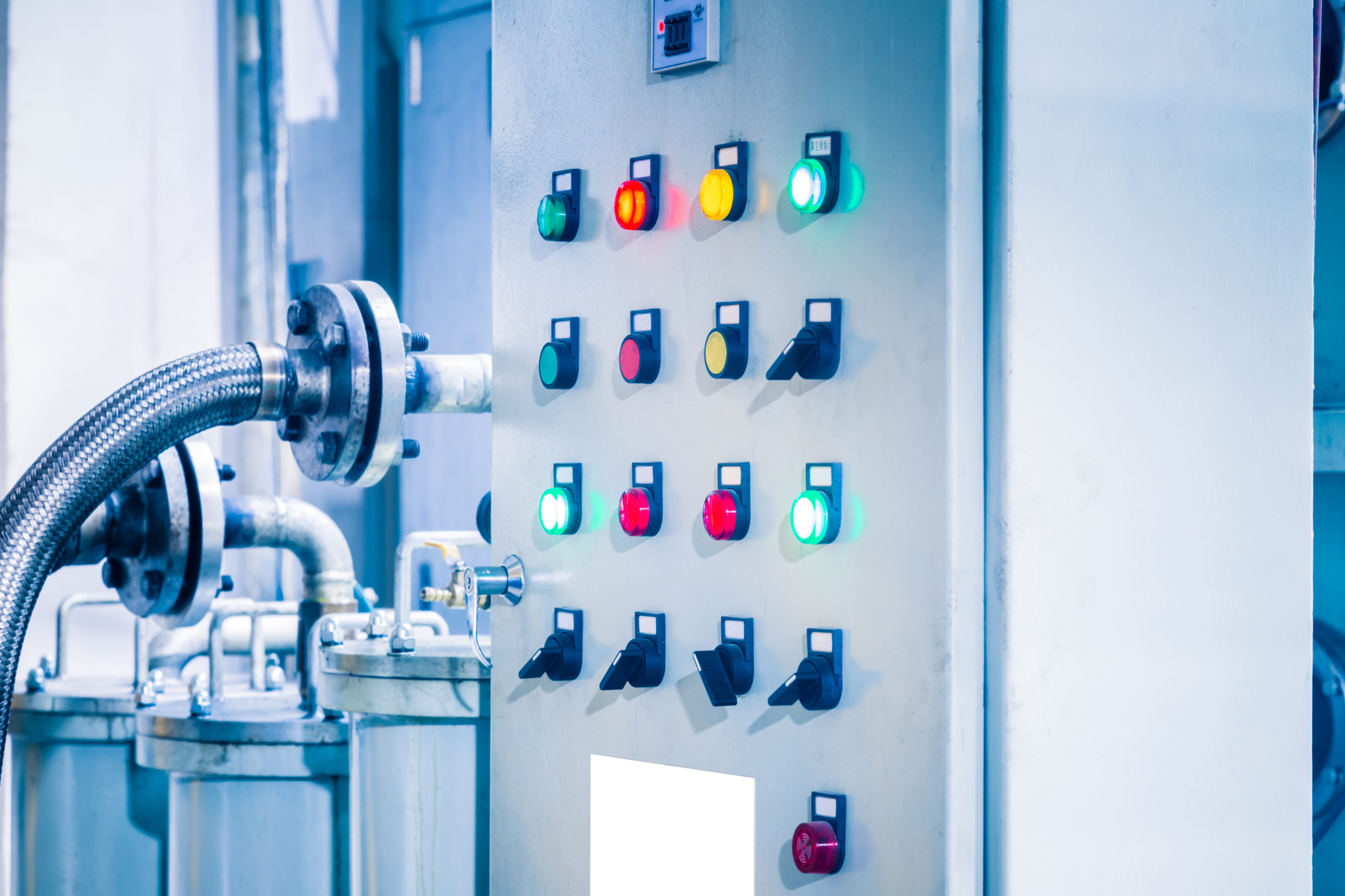 male-electrician-works-switchboard-with-electrical-connecting-cable (1) licensed electrician